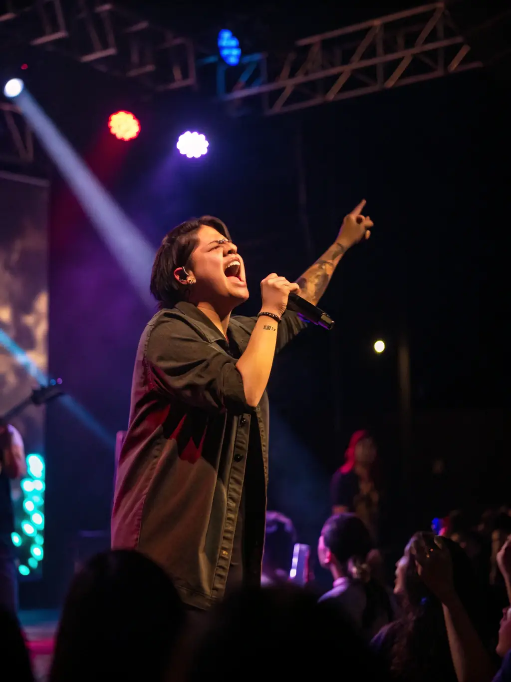 A soloist performing on stage, captivating the audience with their talent and artistry.